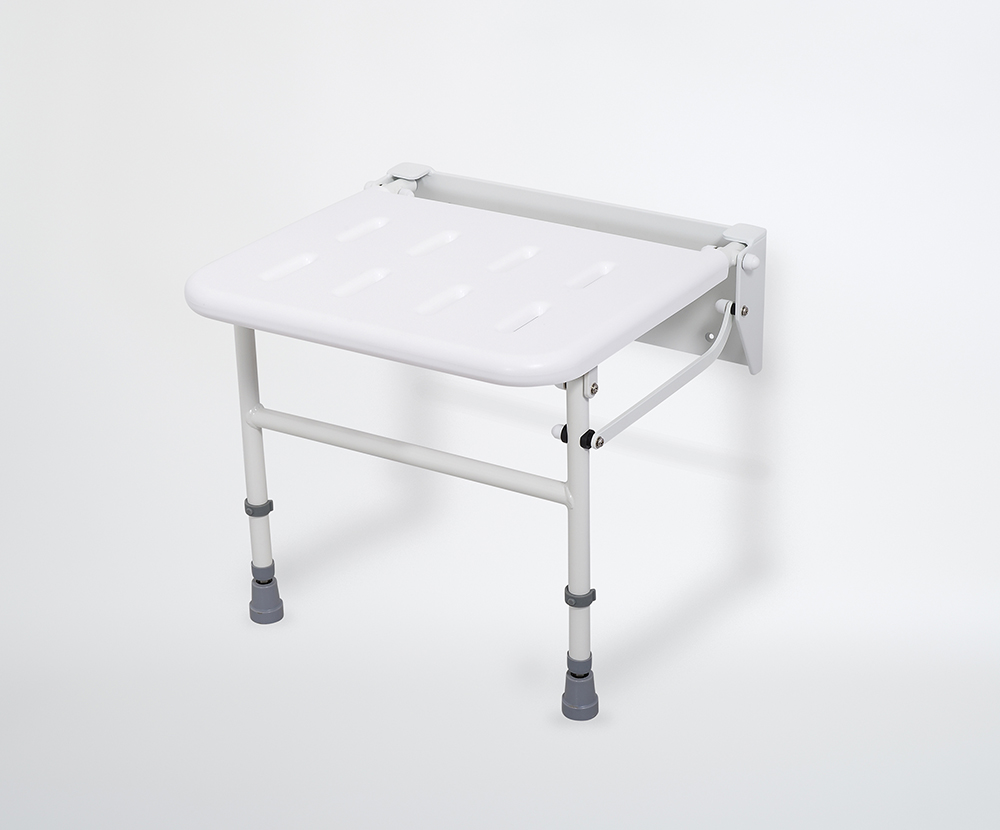 Wall mounted shower seat for disabled bathrooms